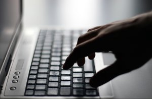 Image of a person typing