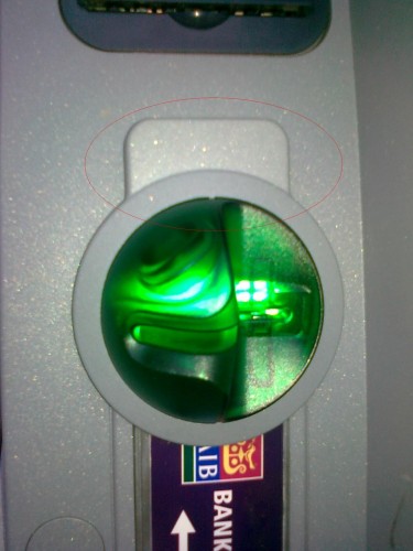 Attached AIB ATM skimming device