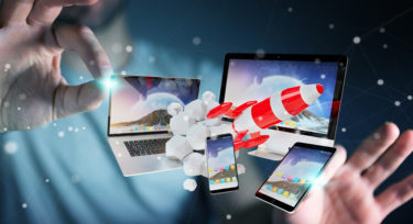 Businessman connecting tech devices and startup rocket 3D render